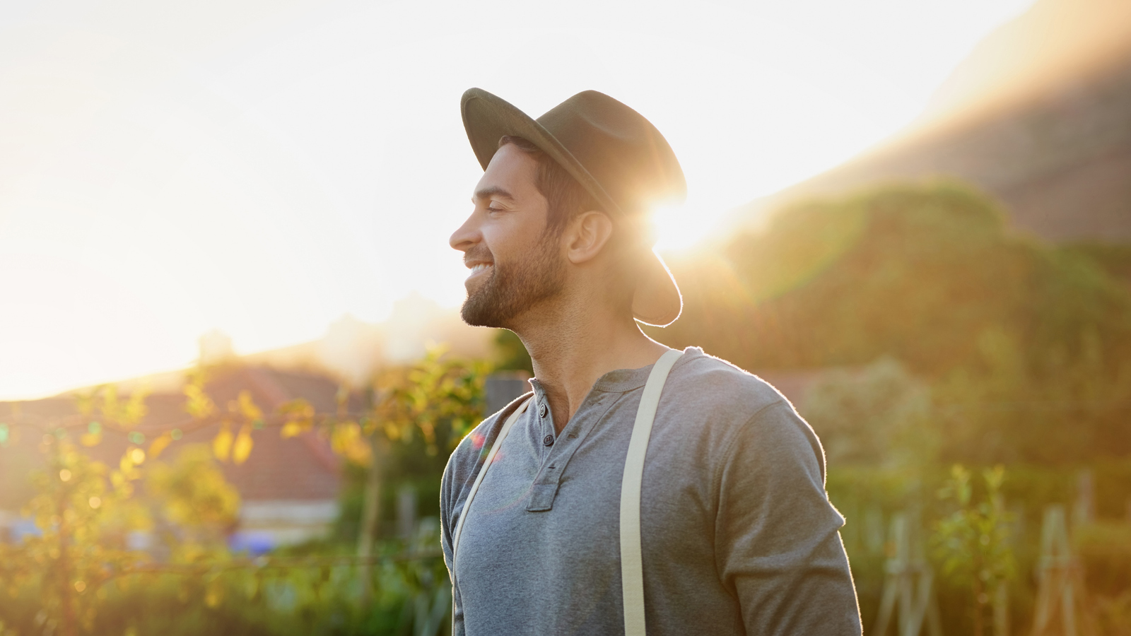 A man stands in the sunlight